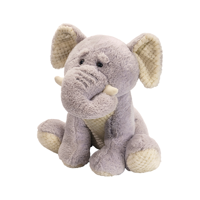 Peluche elefante seduto con naso lungo e orecchie grandi