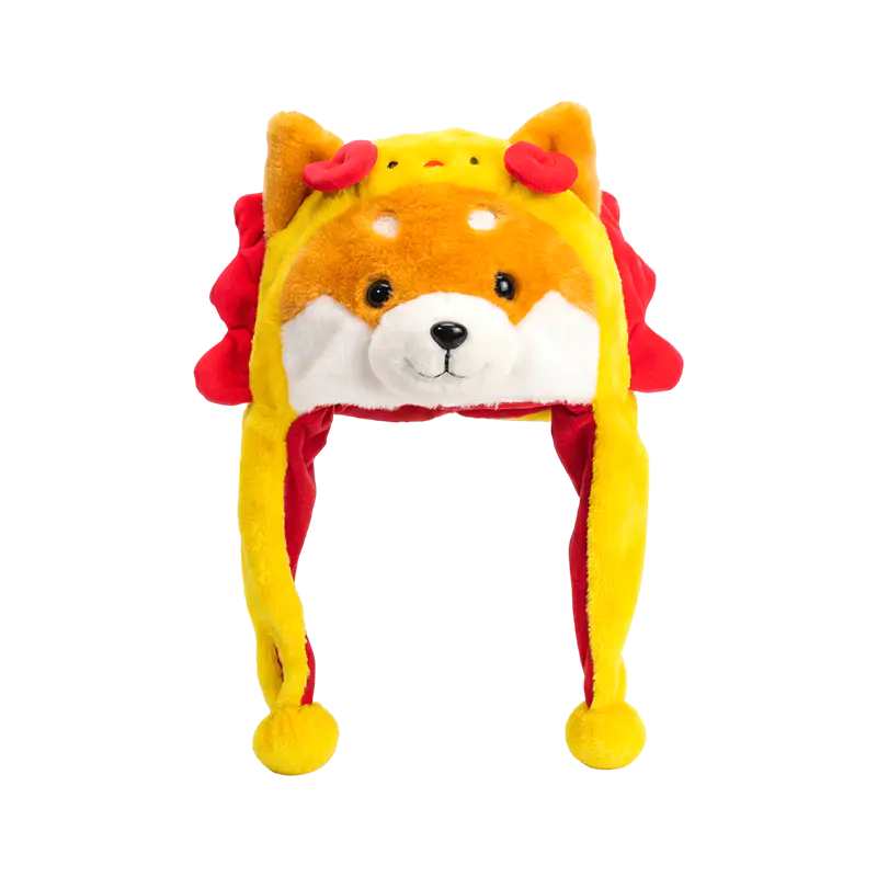 Shiba giallo con cappello di peluche dalla criniera rossa
